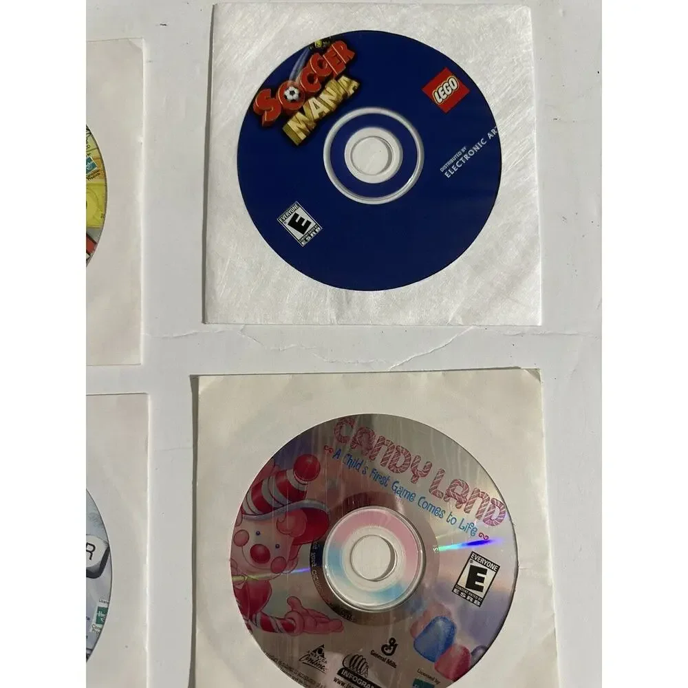 PC Game Lot 7 Gamepack 100 Monopoly Boggle Tetris Candyland Soccer Wheel Fortune